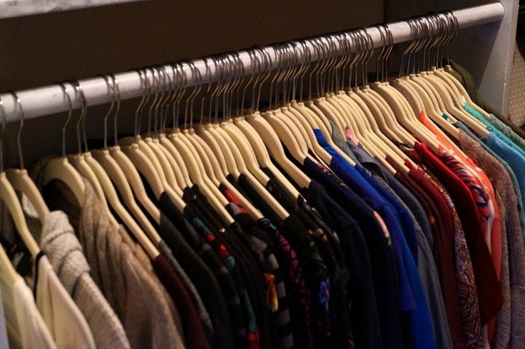 These easy closet organizing ideas will help you declutter and organize any closet! With some easy organizing tips, you will have a clutter free clothes closet! #closetorganization #organization #kenarry