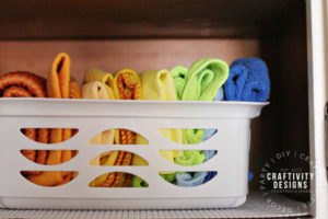 Have a small laundry room? Try these inexpensive, small laundry room storage ideas! It’s easy to organize a small laundry room with clever laundry hacks and tips! - BY Craftivity Designs