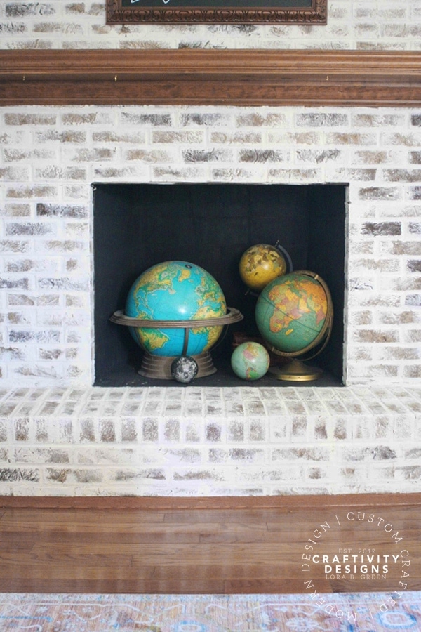 3 Non-Working Fireplace Ideas, Vintage Globes in a Firebox, by Craftivity Designs