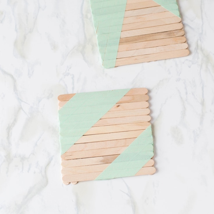 An easy popsicle stick craft tutorial to create your very own coasters!