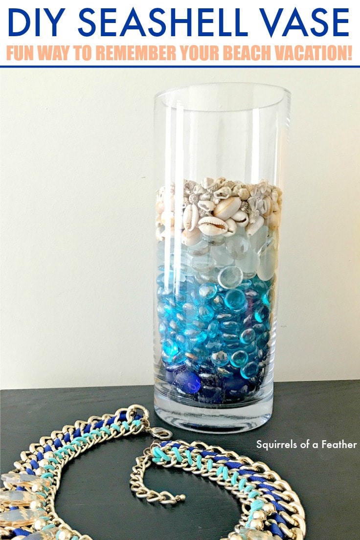 DIY Seashell Vase - A Fun way to remember your beach vacation. A vase with seashells in it sits on a desk. 