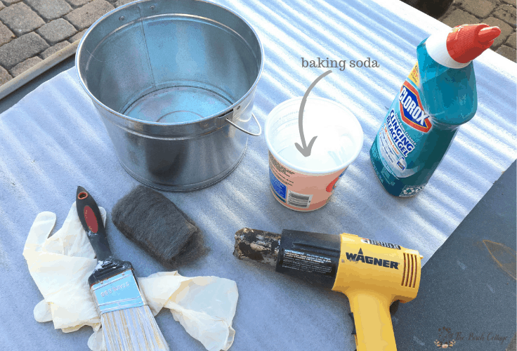 Tools needed to galvanize a metal pail. 