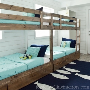 This fun ocean themed bunk room is the perfect sleepover spot for the kids on vacation!