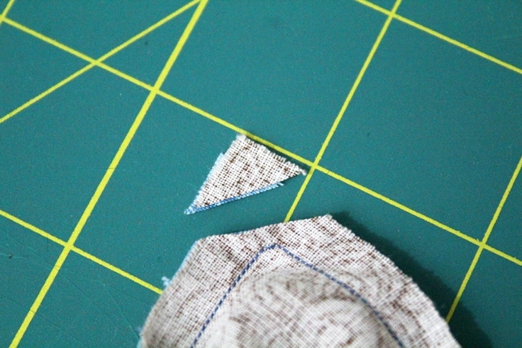 close up of fabric with the corner cut off