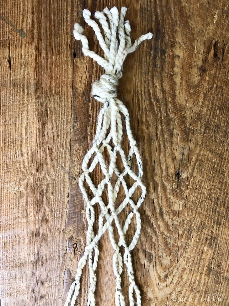 macrame hanging planter with all the knots hanging down. 