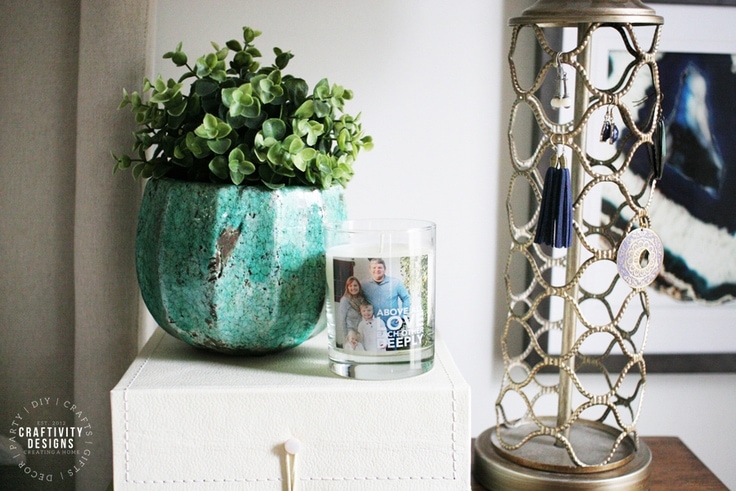 Potted Plant, Personalized Candle, Decorative Box, and Brass Trellis Lamp as Nightstand Decor