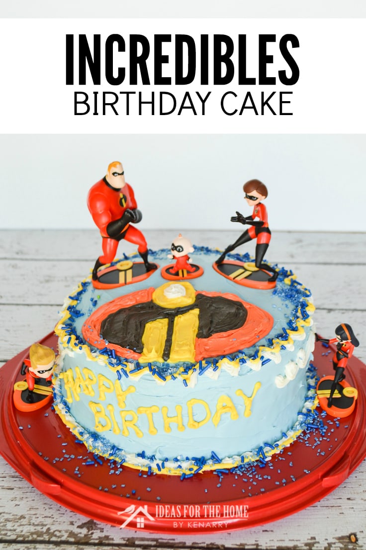 Incredibles birthday cake - Front view of a round cake with figurines of Dash, Violet, Jack Jack, Elastigirl and Mr. Incredible