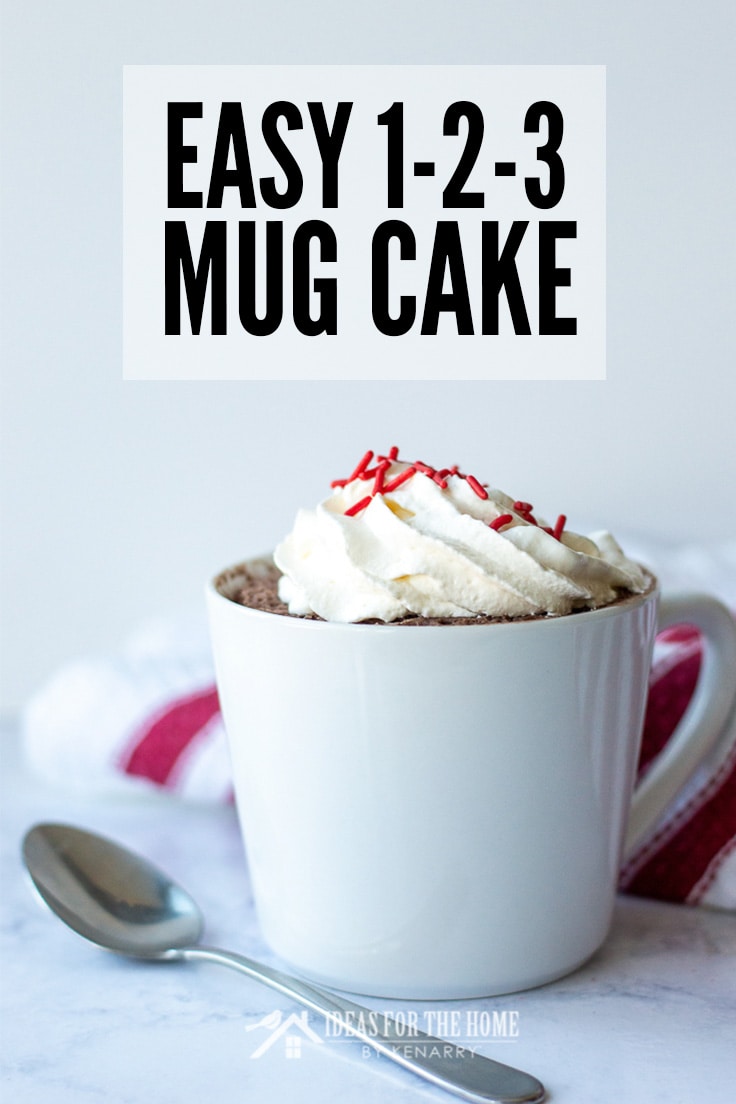 Easy 123 Mug Cake topped with whipped cream and sprinkles