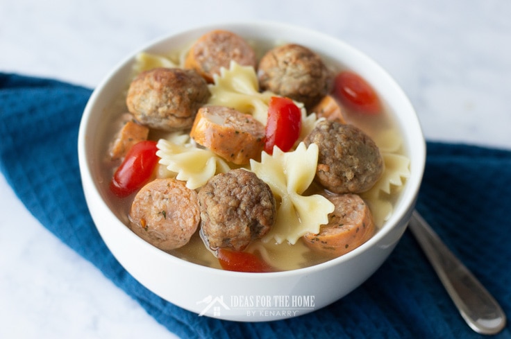 Meatball soup with bow tie pasta, turkey sausage and red peppers