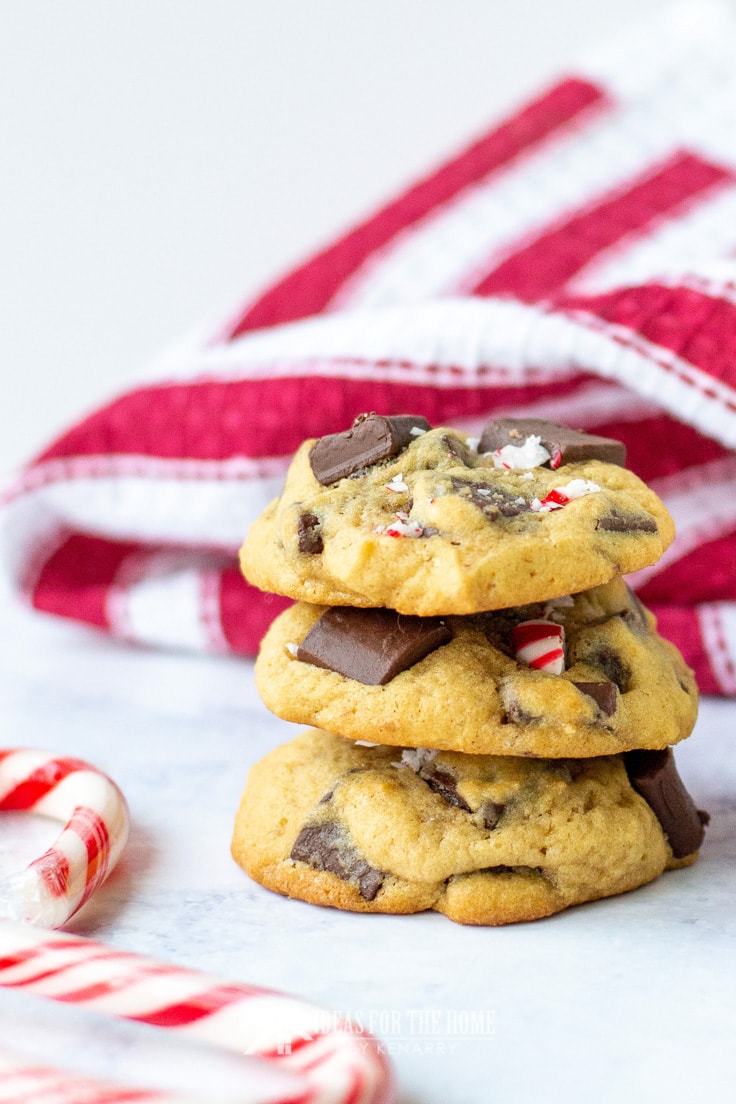 A stack of three delicious cookies filled with chocolate chunks and peppermint mocha